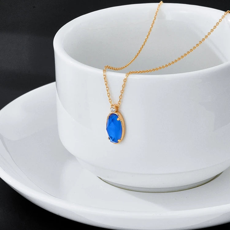 Emotional Factory 925 Sterling Silver 14K Gold Plated Gemstone Prong Setting Blue Glass White Shell Necklace