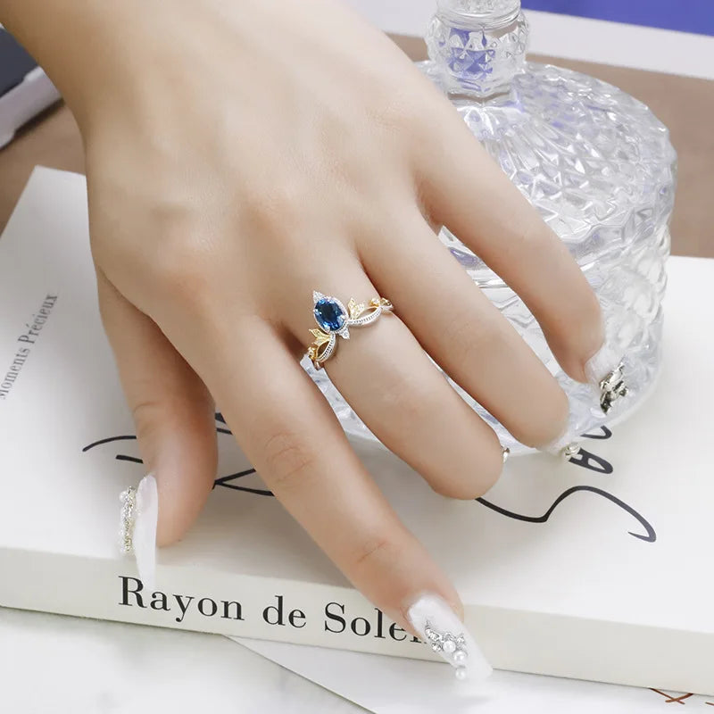 Bagues De Haute Joaillerie 925 Sterling Silver Gold Plated Gemstone Retro Carved Hollow Lace London Blue and White Zirconia Ring