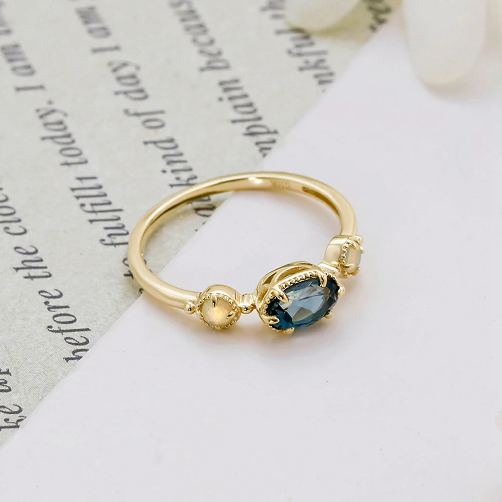 Emotional Factory 925 Sterling Silver 14K Gold Plated Gemstone Series Blue Topaz Paw Set Stone Opal Ring