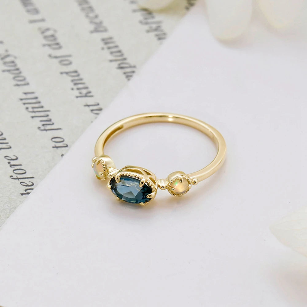 Emotional Factory 925 Sterling Silver 14K Gold Plated Gemstone Series Blue Topaz Paw Set Stone Opal Ring