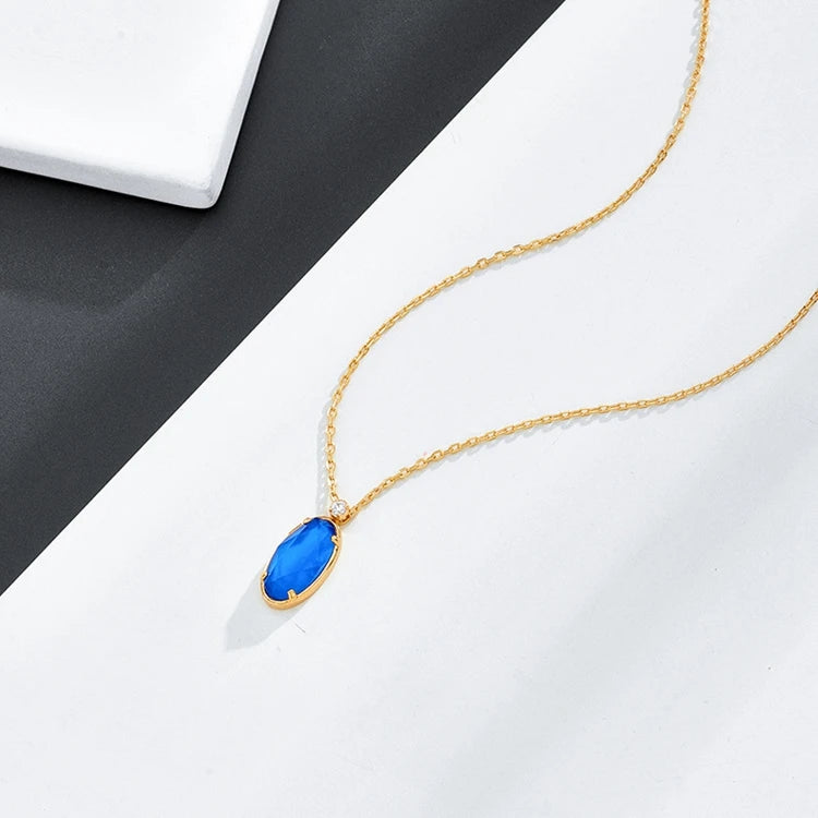 Emotional Factory 925 Sterling Silver 14K Gold Plated Gemstone Prong Setting Blue Glass White Shell Necklace