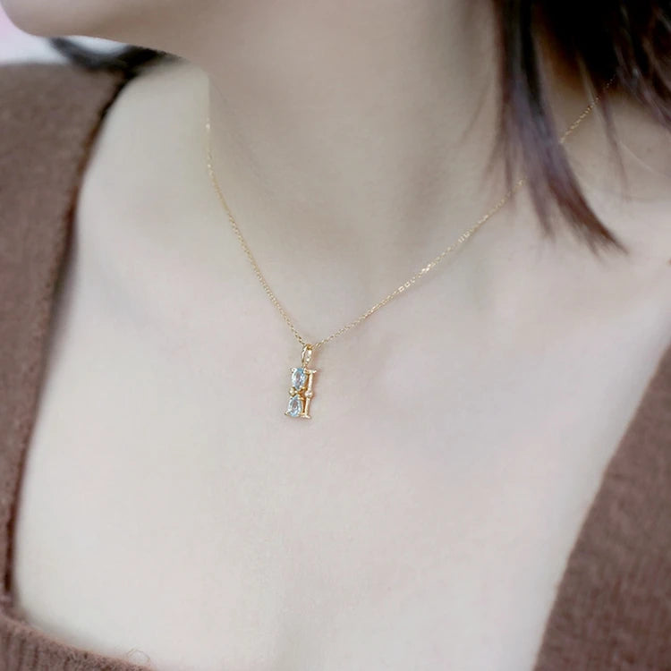 925 Sterling Silver 14K Gold Plated Gemstone Water Droplets Natural Sky Blue Topaz Hourglass Necklace