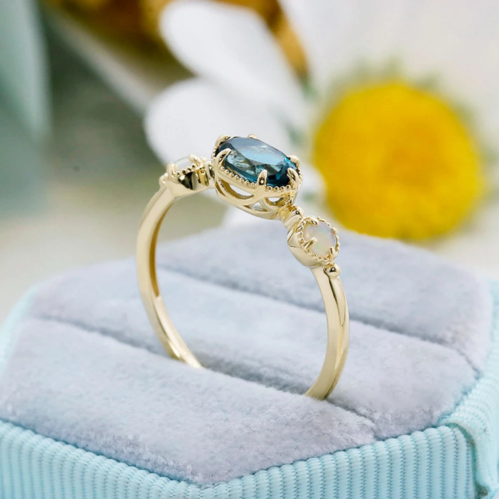 Emotional Factory 925 Sterling Silver 14K Gold Plated Gemstone Series Blue Topaz Paw Set Stone Opal Ring
