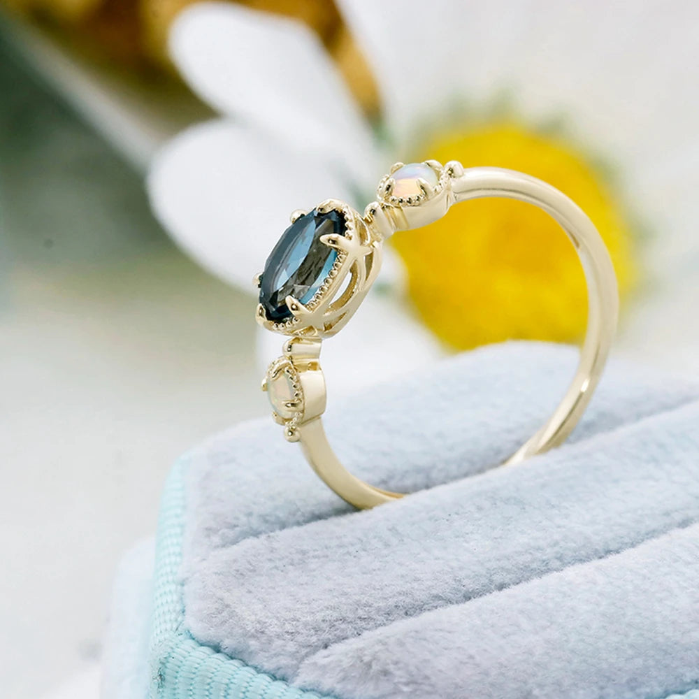 Emotional Factory 925 Sterling Silver 14K Gold Plated Gemstone Series Blue Topaz Paw Set Stone Opal Ring